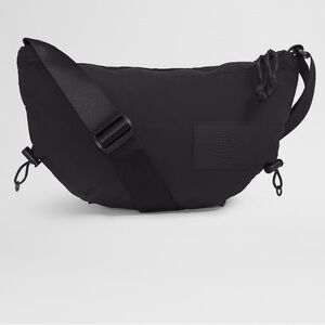 The North Face Never Stop Exploring crossbody crescent bag